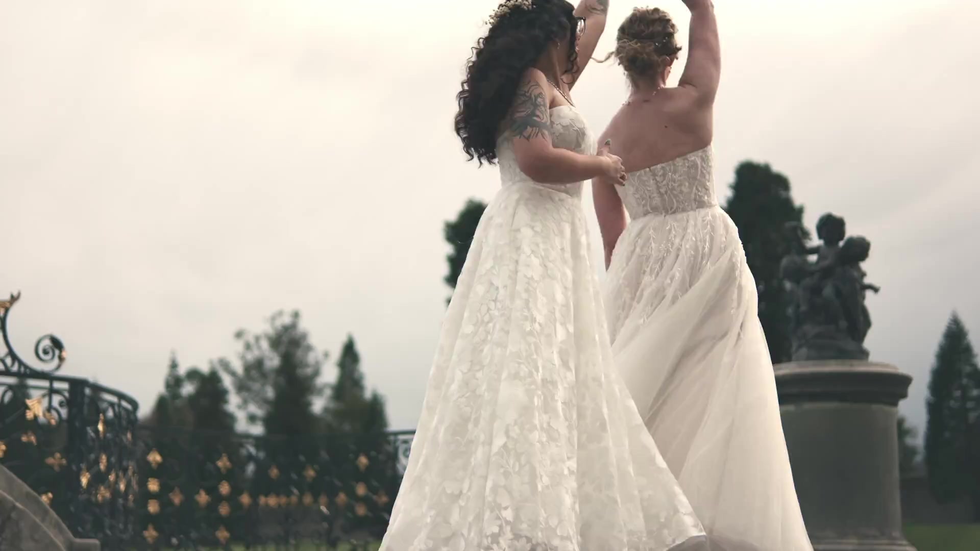 A wedding kiss under blossoming branches